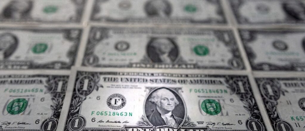 FILE PHOTO: Illustration shows U.S. dollar banknotes