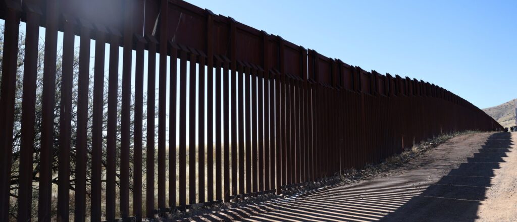 FACT CHECK: Viral Video Claims To Show Migrants Attempting To Storm US-Mexico Border