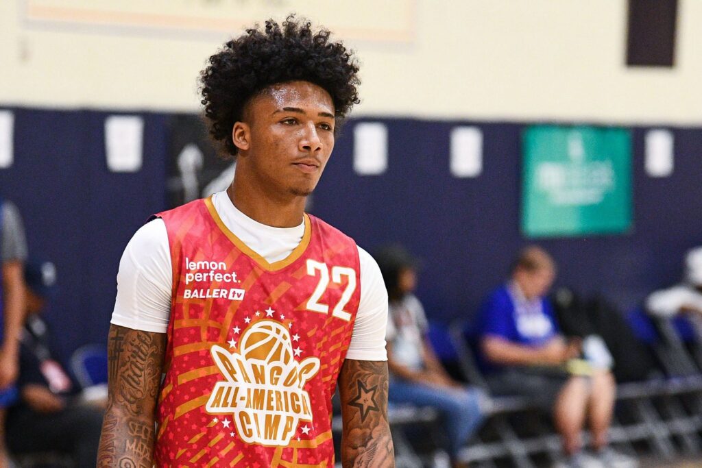 Williams coming down court in a HS basketball game