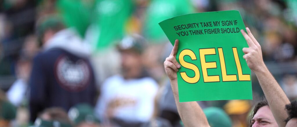 Oakland Athletics fans display signs