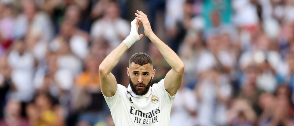 Real Madrid teammates throw Karim Benzema in the air after his final match for the club on June 4 2023. (Photo by Florencia Tan Jun/Getty Images)