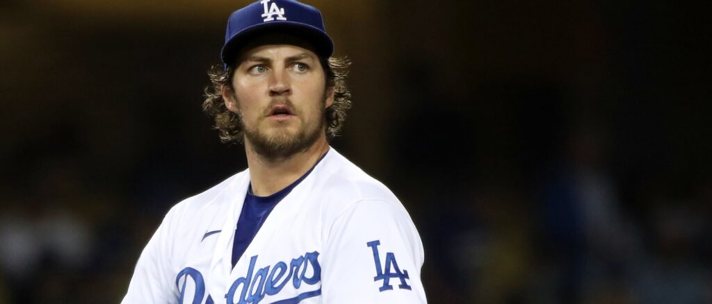 Trevor Bauer #27 of the Los Angeles Dodgers looks on after giving up a hit to Joey Gallo #13 of the Texas Rangers during the fifth inning at Dodger Stadium on June 12, 2021 in Los Angeles, California. (Photo by Katelyn Mulcahy/Getty Images)