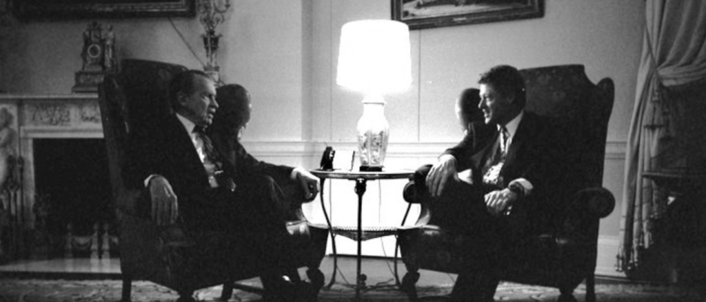 Former President Richard Nixon visits with President Bill Clinton in the family quarters of the White House, March 8, 1993. (Photo credit: Bob McNeely/White House Photo Office via Wikipedia)