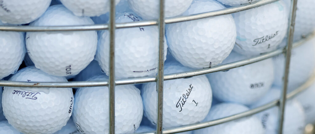 Titleist golf balls sit near the driving range during the first round of the Visit Knoxville Open at Holston Hills Country Club on May 25, 2023 in Knoxville, Tennessee. (Photo by Alex Slitz/Getty Images)