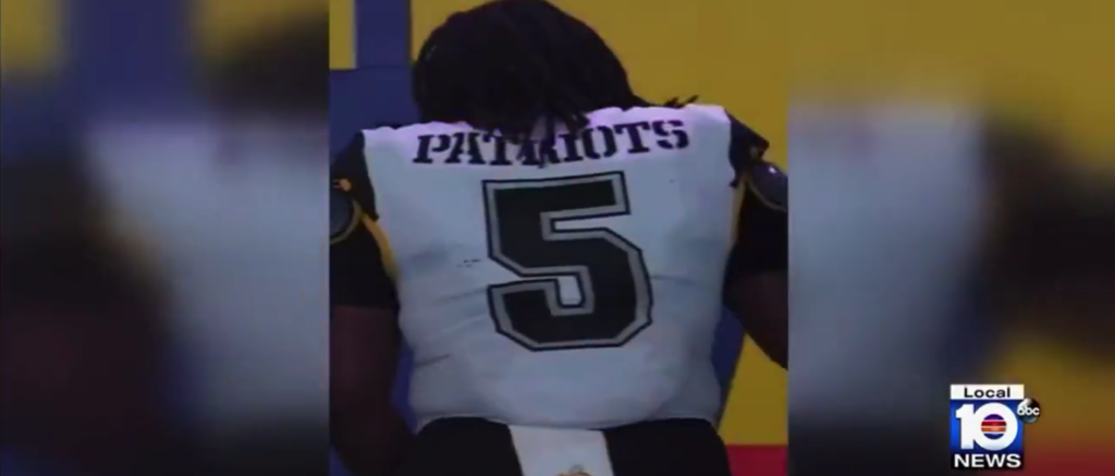 After suffering cardiac arrest during a game, South Florida high school football player Timothy Burroughs-Love is still undergoing treatment in the hospital. [Twitter/Screenshot/Public — @IanMargolWPLG]