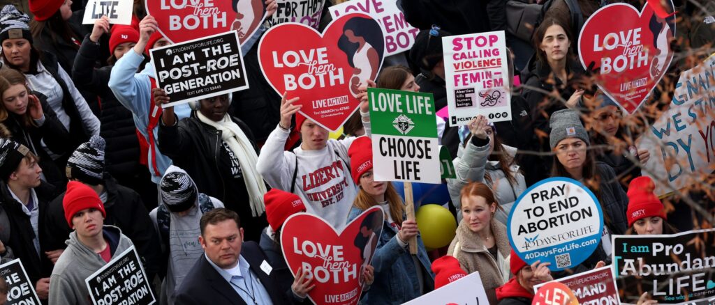 This photo illustration created in Washington, DC, on July 6, 2023, shows the opening page of Threads, an Instagram app, near the Meta logo. More than 10 million people have signed up to Threads, Meta