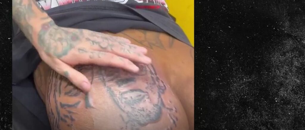 Dennis Rodman Tattoo of girlfriend on his butt
