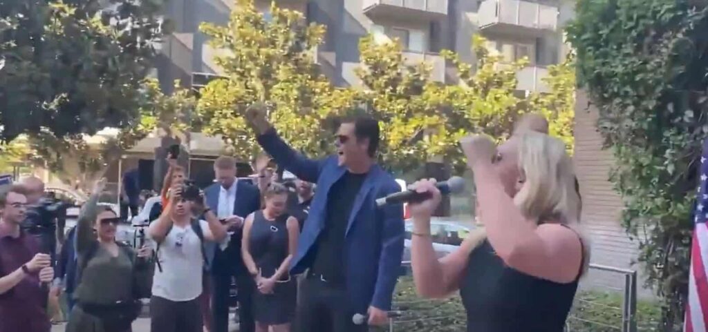 Matt Gaetz and Marjorie Taylor Greene hold sidewalk rally