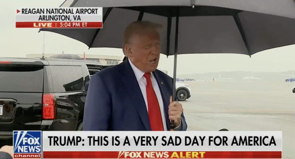 Donald Trump speaks to the press after his arraignment in DC.