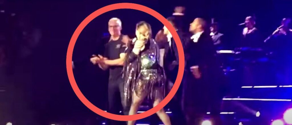 Anderson Cooper at Barclays Center with Madonna on stage
