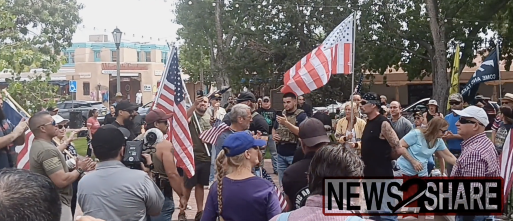 New Mexico gun owners sent a peaceful but powerful message to Democratic Gov. Michelle Lujan Grisham Sunday by openly carrying their firearms after Grisham placed a 30 day ban on their God-given Second Amendment right.  [Screenshot Twitter News2Share]