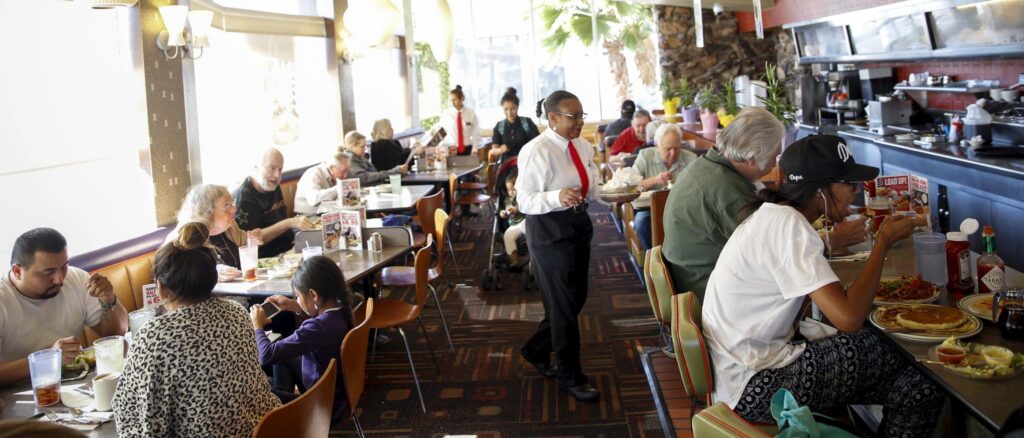 Customers dine at Norms Diner on La Cienega Boulevard in Los Angeles, California