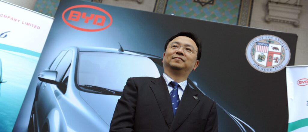 BYD Chairman Wang Chuanfu poses in fron