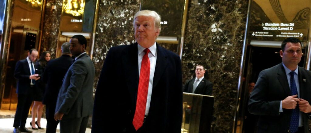 U.S. President-elect Donald Trump speaks to members of the news media in the main lobby at Trump Tower in New York