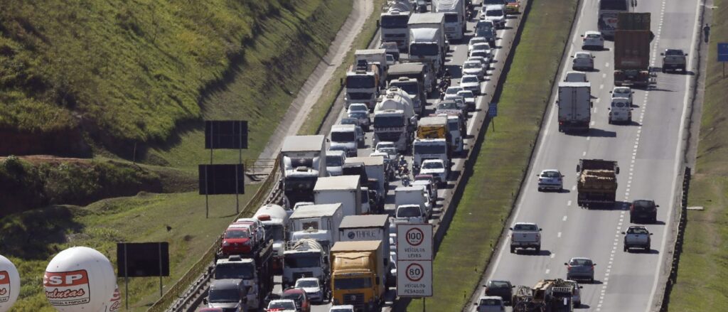 Workers of General Motors protest against job cuts next to the GM plant in Sao Jose dos Campos