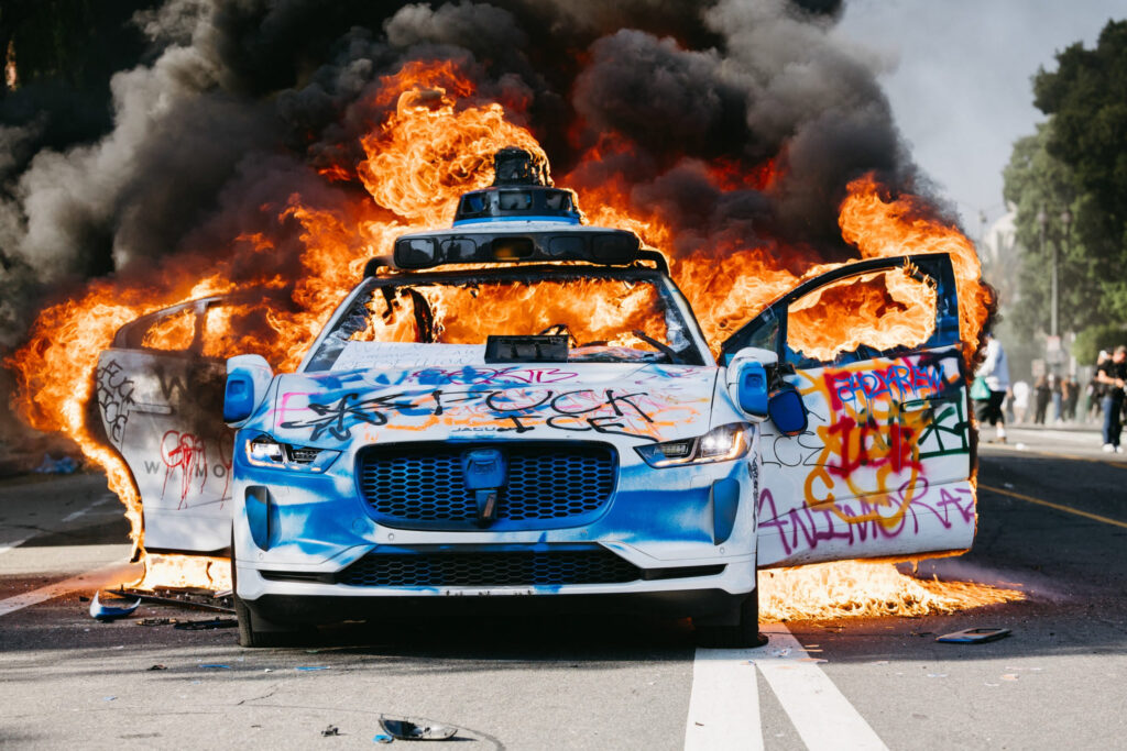 Self-Driving Taxis Steer Clear Of LA Migrant Riots