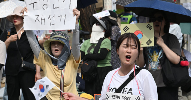 Protesters Mark Two Weeks Denouncing Election Fraud After Widespread Ballot Shortages