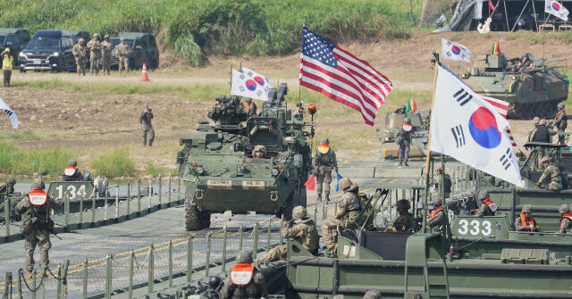 South Korea Urges Direct Trump-Kim Talks as War Games End Early