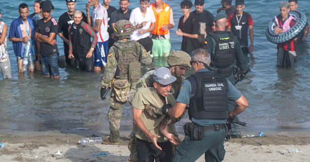 Spanish Minister Fuels Blame on Israel over Ceuta Migrant Crisis