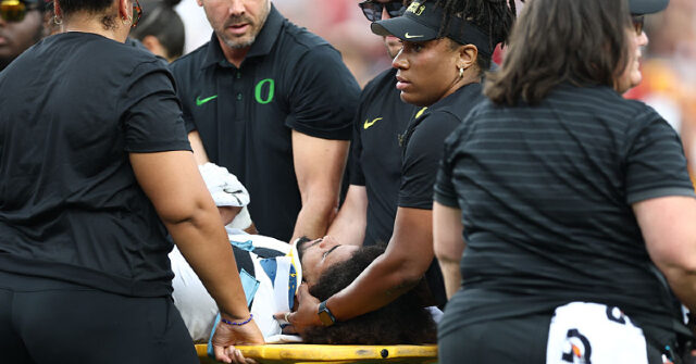 USC Player Smiles on Sideline After Illegal Hit that Sent Oregon QB to the Hospital