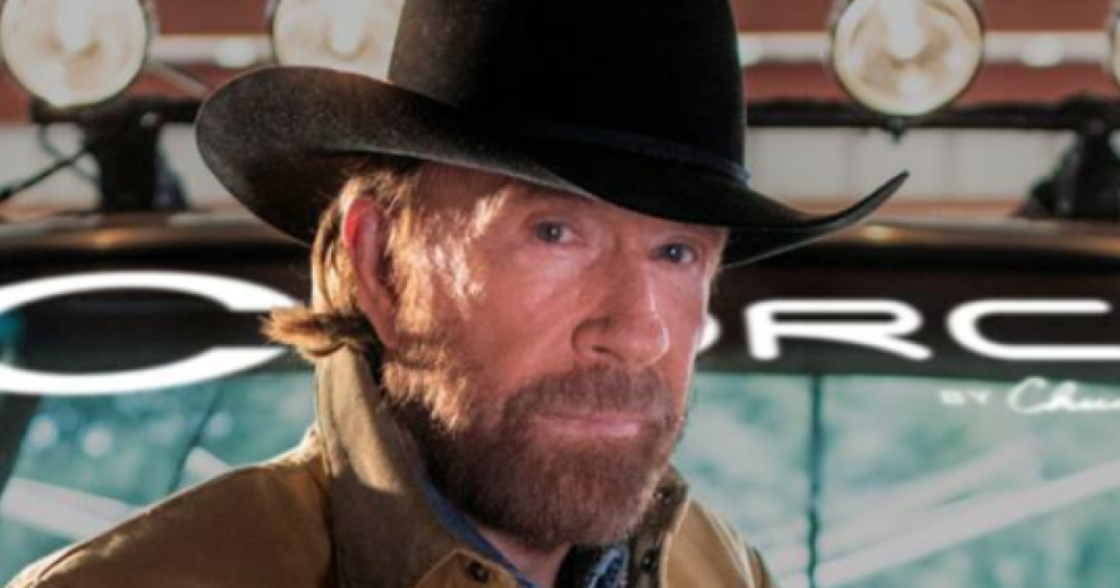 Little Watched Emmy Awards Show Snubs Action Star Chuck Norris During ‘In Memoriam’ Segment * The Gateway Pundit * by Mike LaChance Chuck Norris poses confidently in a cowboy hat and jacket in front of a vehicle, promoting his brand Force.
