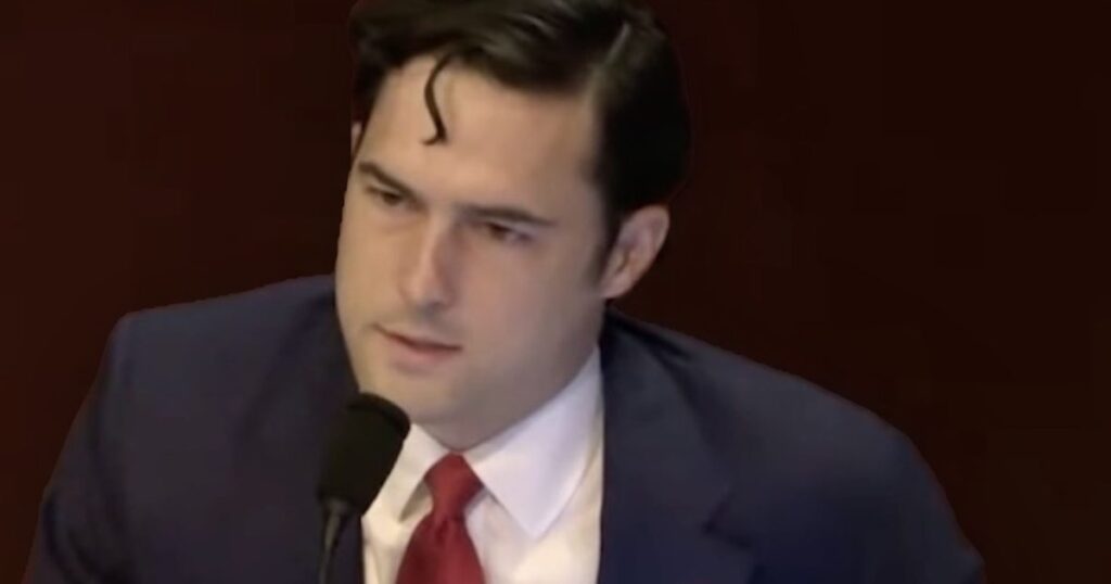 ‘You Guys Can Get Lost’ (VIDEO) * The Gateway Pundit * by Mike LaChance Man in a suit speaking at a microphone during a formal event, displaying a focused expression and styled hair.