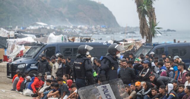 Spanish Police Begin to Clear Illegal Migrants from Ceuta Beach Camp